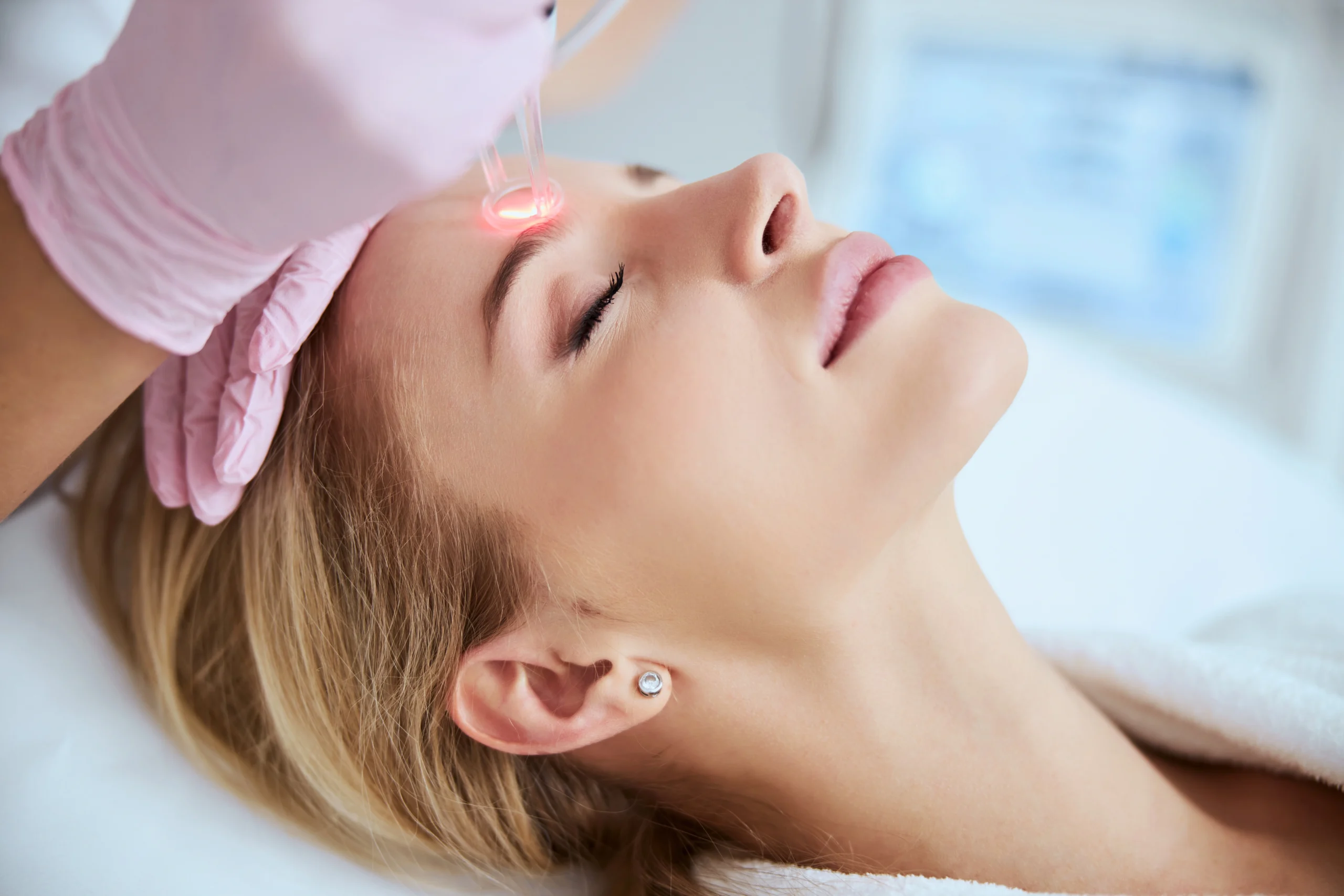 Woman getting laser treatment | Truth Med Spa | Lakewood, CO